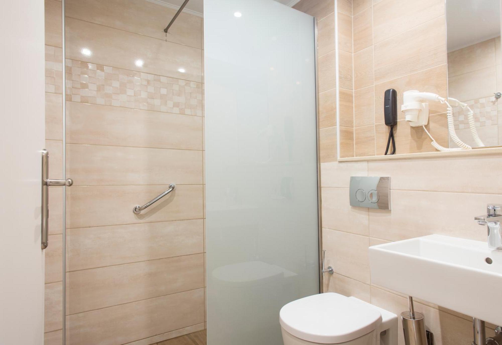 Ilyssion Holidays Hotel إياليسوس الغرفة الصورة